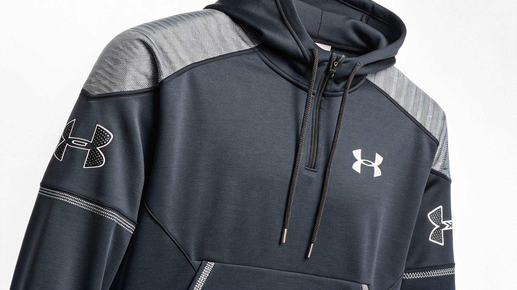  A custom sweatshirt inspired by Under Armour, made with fleece and French terry fabrics, featuring sleek, athletic details and personalized logos, showcasing a perfect blend of comfort, performance, and customization options.
